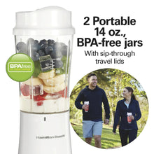 White personal blender with blending jar and two portable BPA-free travel jars with sip-through lids