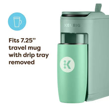 Keurig K-Mini Mate pod coffee maker in Glamping Green with open brew area and base