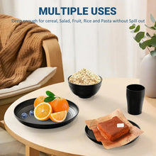 Black wheat-straw dinnerware set with dinner plate, serving bowl, and cup