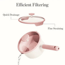 Ceramic nonstick saucepan with pink strainer lid, tilted pouring view