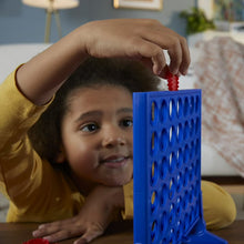 Blue Connect 4 grid game with red and yellow discs on the stand