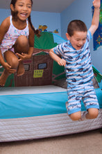 Treehouse play tent with blue floor, open front, and green roof; children playing inside