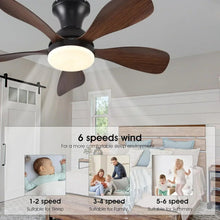 Low profile ceiling fan with light, black housing and brown reversible blades