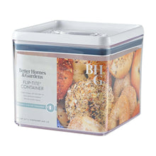 Airtight bagel food storage container with mixed bread items inside, clear sides, white flip lid