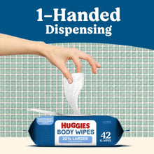 Huggies body wipes one-handed dispensing, hand pulling a wipe from the pack