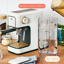 White espresso machine with black drip tray and clear removable water reservoir
