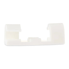 Translucent adhesive cable management clip, snap-style holder with backing pad