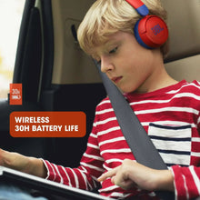 Child wearing red and blue JBL kids wireless on-ear headphones with padded earcups