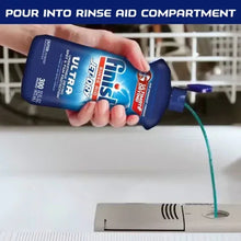 Dishwasher rinse aid being poured by hand into the rinse aid compartment