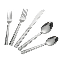 Stainless steel flatware set with two spoons, a knife, and forks