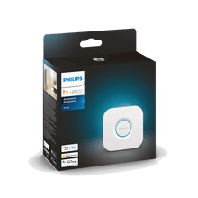 Wireless lighting bridge accessory box showing a white Philips Hue hub device