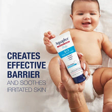 Aquaphor Baby 3-in-1 diaper rash cream tube held by an infant