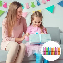 Child holding a board while placing small multicolor bottle caps into a tray