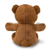 Tan teddy bear plush with white belly panel
