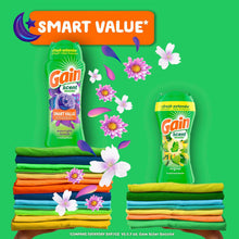 Gain scent booster lineup: green bottle plus folded towels in stacked colors.