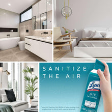 Lysol Air Sanitizer spray bottle held in hand with teal trigger cap visible