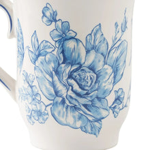 Blue floral stoneware mug close-up with roses and leaves