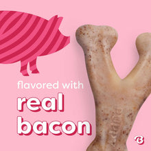 Speckled tan rubber wishbone chew for puppies, bacon-inspired look.