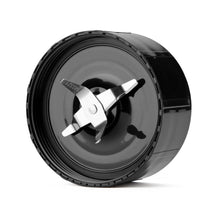 Personal blender blade assembly with cross blades inside a black jar