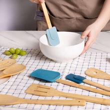 Bamboo kitchen utensil set with blue silicone heads and wooden handles