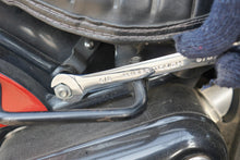 Combination wrench with 9/16 in markings and box-end jaw