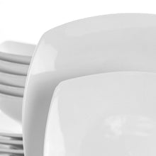 White square porcelain dinnerware set: close-up of stacked plates