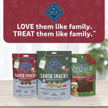 Set of holiday dog treat packages with two Santa Snacks bags shown.