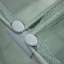 Mesh bin corner joint with two plastic connector caps on a laundry sorter frame