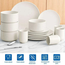 White speckled dinnerware set with stacked cups, bowls, and round plates