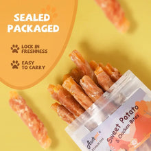 Sealed sweet potato chicken bite treats in clear pouch with stacked chew sticks