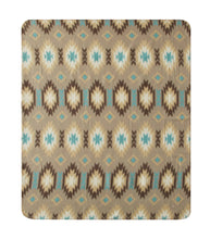 Aztec geometric fleece blanket pattern in tan, brown, and teal with diamond accents.