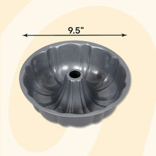 9.5-inch non-stick fluted tube cake pan with dark gray interior and center hole