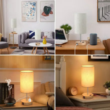 Pair of touch table lamps with cream shades, metal poles, and wood bases on side tables