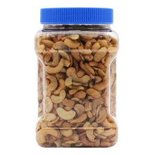 Cashew halves and pieces jar with blue lid, clear container and cashews inside