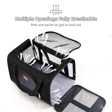 Black pet carrier with fully opened top door, side zippers, and mesh panels