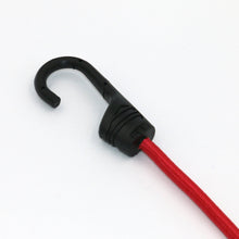 Red bungee cord with black hook, single cord on white background