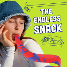 Fruit snack roll being eaten by child, red and blue tie-dye