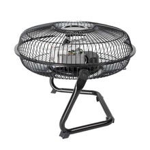 Metal high-velocity fan with wire grille and black stand, front view