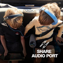 Kids wearing black over-ear headphones with teal accents