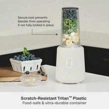 Single-serve blender with locked lid and sand white base