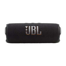 JBL Flip 7 portable speaker in black, front view with JBL logo on textured fabric