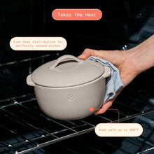 Porcini taupe covered casserole dish on oven rack with lid and side handles