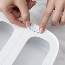 White 5-slot food bag dispenser with a SANDWICH label and open slot