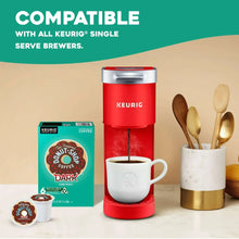 K-Cup dark roast coffee pods with compatible brewer and mugs