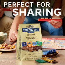 GHIRARDELLI premium chocolate squares assortment bag on table with snack pieces