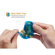 Blue handheld pencil sharpener held in hands, with hinged tray for waste disposal