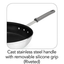 Nonstick restaurant fry pan with black interior and cast stainless handle, silicone grip riveted