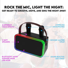 Karaoke speaker with two wireless microphones and sound-reactive multicolor LED lights