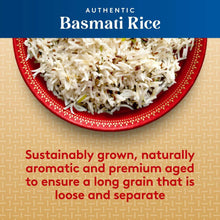 Uncooked basmati rice in a red dish, long-grain rice
