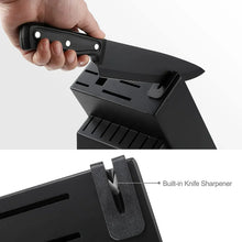 Knife drawer-style block with built-in sharpener, shown with a black handle knife.